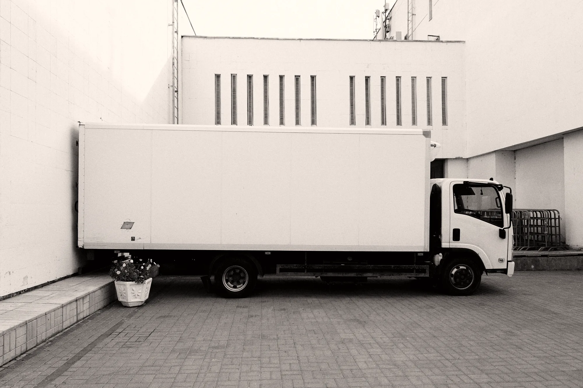 Box truck in profile, prepared for a scheduled delivery run